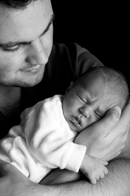 man holding baby